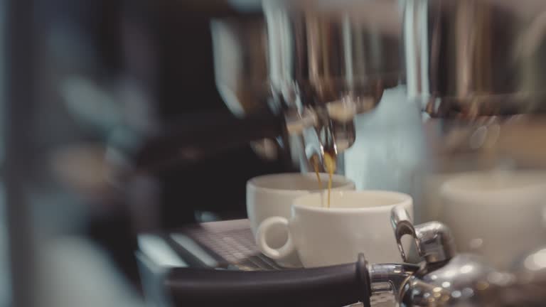 Barista making coffee at coffee shop