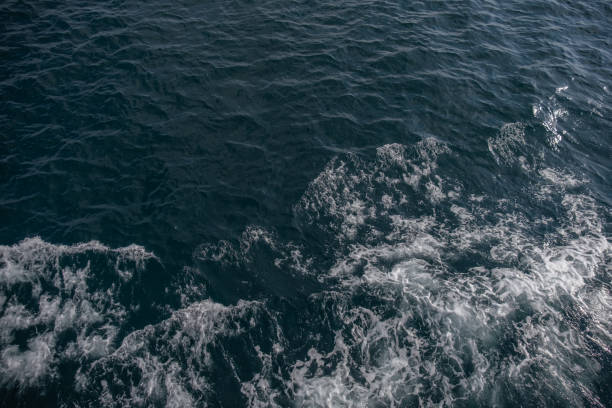 istock waves like white foam in the sea 1614331433