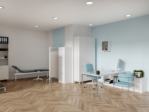 Modern medical office interior with doctor's workplace and examination table, side view. Desk with pc computer and consulting corner. Shelf with documents and partition on hardwood floor. 3D rendering