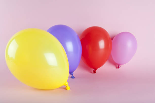 istock balloons in harmonious colors on a pink background 1614367646