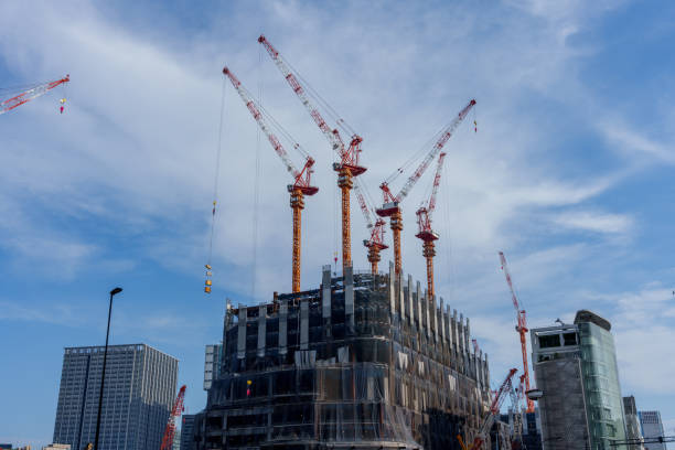 istock A building construction site and a forest of cranes and heavy machinery 1614373193