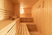 Small home wooden sauna, spa room. Relax in a hot sauna.