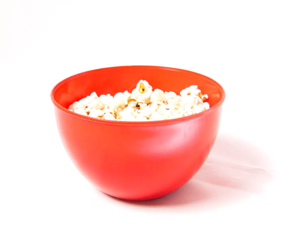 istock Bowl of popcorn on white background 1614423767