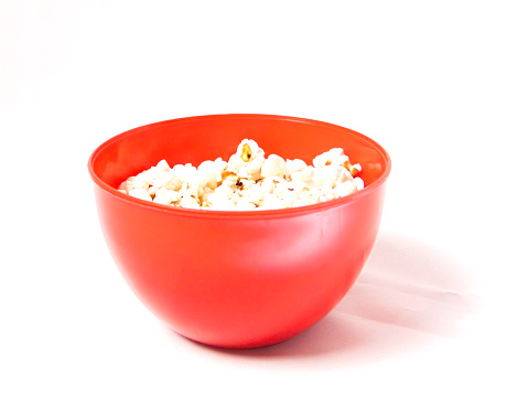 Bowl of popcorn on white background