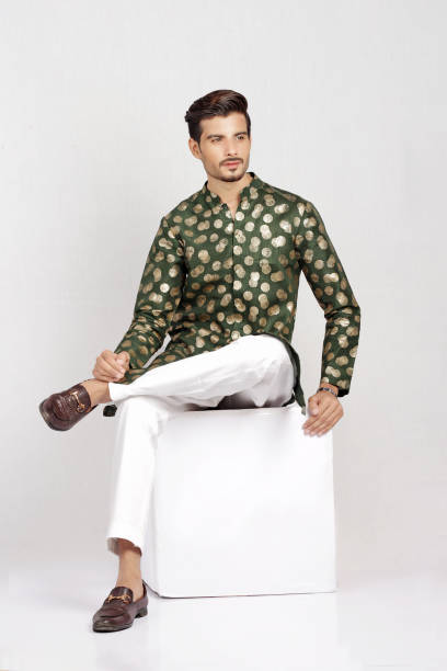 istock Male model posing in green kurta 1614456156