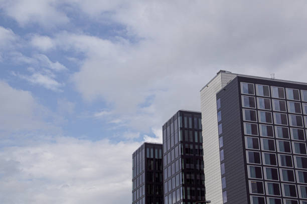 istock Low angle view of buildings against sky 1614466583