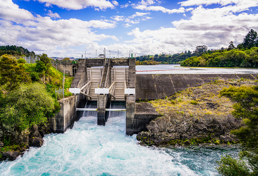 The sluice gates open at the dam forming part of the hydroelectric power station at Lake Aratiatia in the Waikato region of New Zealand.