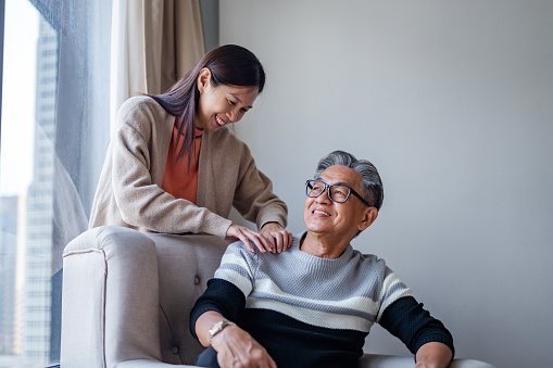 Multigeneration family spending quality time together at home