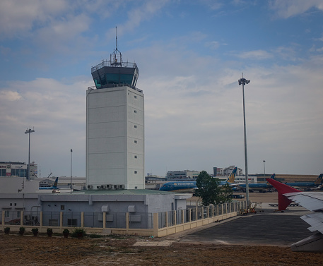 Saigon, Vietnam - Feb 27, 2016. Control Tower of Tan Son Nhat Airport in Saigon, Vietnam. Tan Son Nhat is the busiest airport in Vietnam with 32.5 million passengers in 2016.