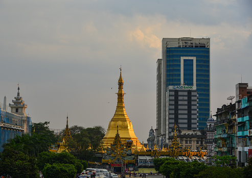 Yangon, Myanmar - Feb 1, 2017. Sule Pagoda with many buildings at downtown in Yangon, Myanmar. Yangon is the country main centre for trade industry and tourism.