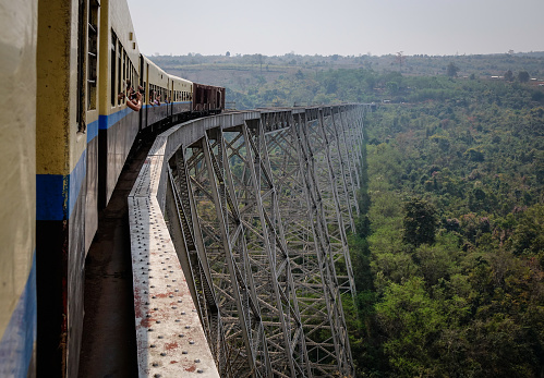 Shan, Myanmar - Feb 23, 2016. A train running on the Goteik viaduct in Nawnghkio, Shan State, Myanmar. Gokteik Viaduct is the highest bridge in Myanmar.