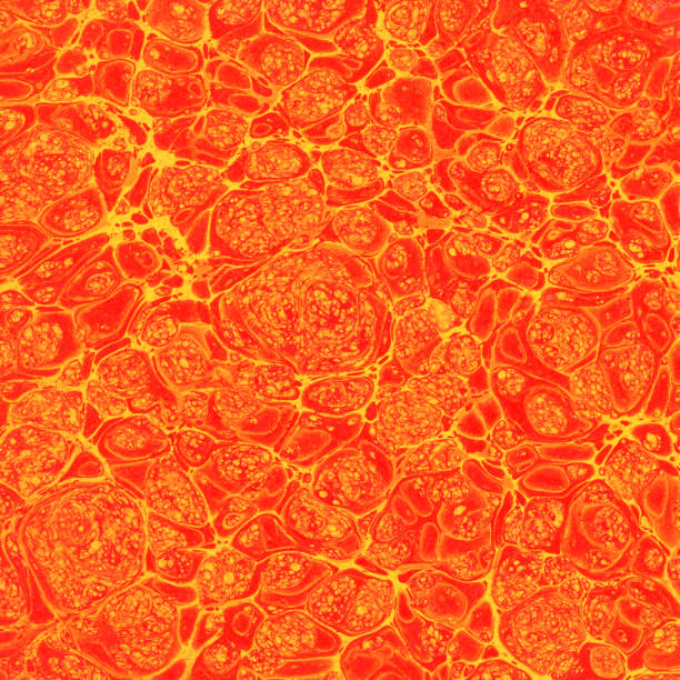 Antique orange gloster pattern paper marbling full frame.