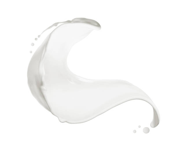 istock Gentle milk splash in the air on a white background 1614623757