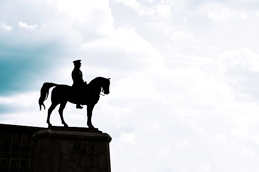 silhouette of monument of Ataturk with copy space for text. Turkish national holidays background photo.