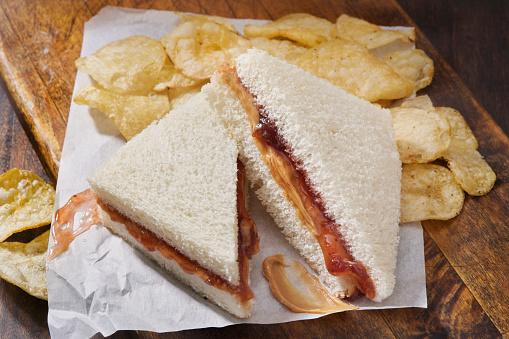 Peanut Butter and Strawberry Jam Tea Sandwich with Kettle Potato Chips