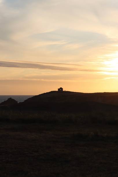 istock Little house at sunset 1614720284