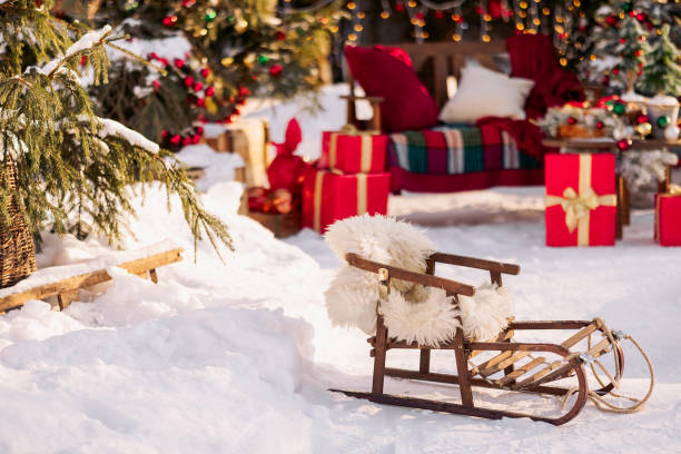 istock Authentic wooden old sled on Christmas background 1614723972