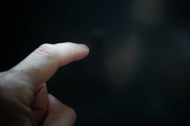 istock index finger pointing at digital screen to turn on the screen 1614760113