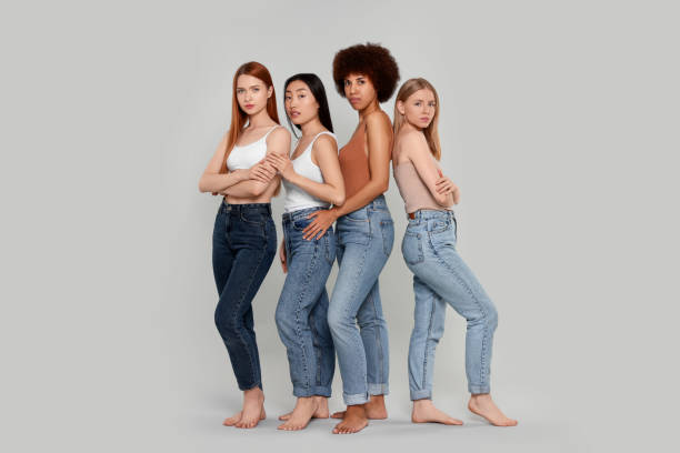 istock Group of beautiful young women on light grey background 1614762802