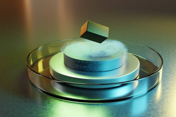 Artificial floating rock on a stack of metallic disc and magnet which in turn in a petri dish. Illustration of the concept of potential room temperature superconductors Artificial floating rock on a stack of metallic disc and magnet which in turn in a petri dish. Illustration of the concept of potential room temperature superconductors Impurities stock pictures, royalty-free photos & images