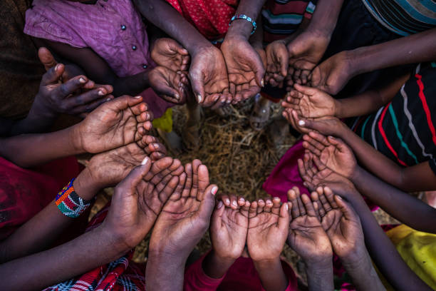 istock Hands of poor - asking for help, Africa 1614797207