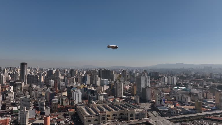 Airship flying over the city