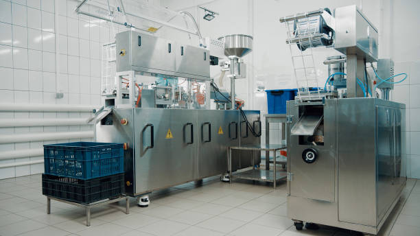 istock 4K Blister Packing Machine. Tablet pharmaceutical blister packaging machine in supplement drug manufacture. Production system with fast format changeover and simple operating concept 1614837013