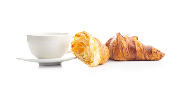 istock Fresh butter croissant and coffee cup isolated on white background. 1614846468