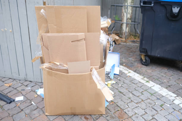 waste paper collection for processing, box with cardboard packages on street, sheets of used paper for recycling, Sustainable Packaging and Waste Reduction