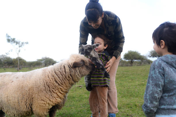 istock outdoor family with animals 1614874136