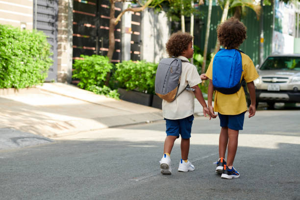 istock Kids Walking to School 1614874401