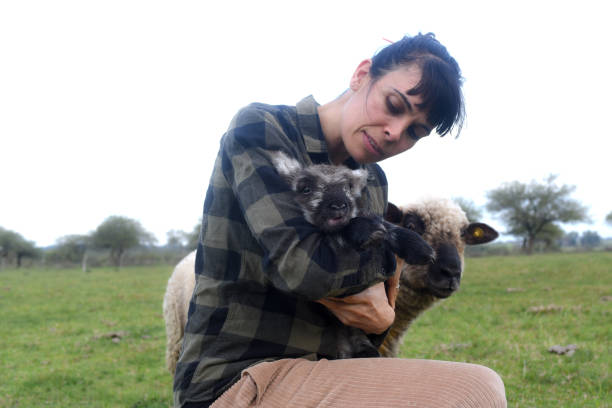 istock outdoor Woman with animals 1614874940