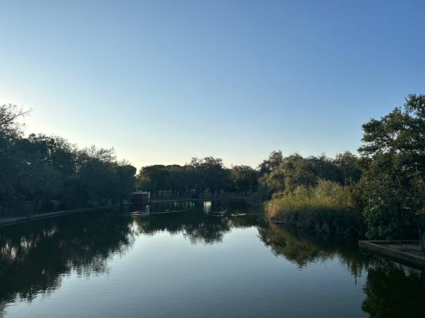 istock Large wide and calm lake in Alamillo Park 1614875011