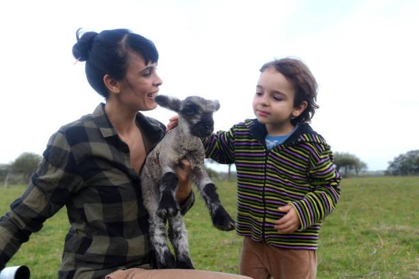 istock outdoor family with animals 1614875499