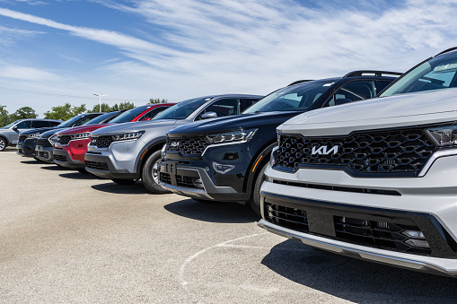 Fishers - August 13, 2023: Kia Car, SUV and EV dealership. Kia offers the Sportage, Telluride, Sorento and Niro EV.