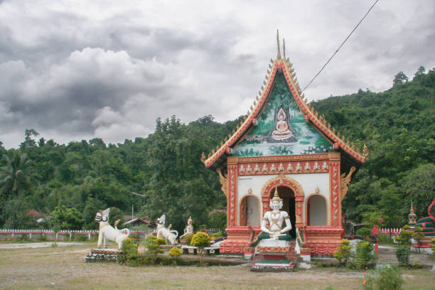 istock Ornate, colourful Buddhist temple in rural Vang Vieng. 1614970909