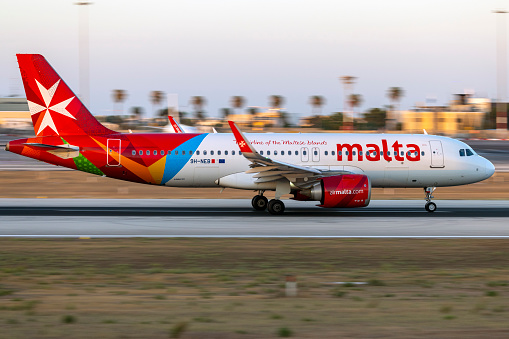Luqa, Malta - August 10, 2023: Air Malta Airbus A320-251N (REG: 9H-NEB) on its take off run.