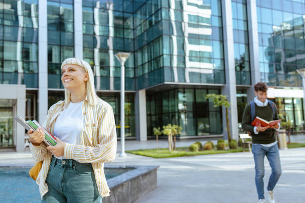 istock Students in modern part of the city 1614980982