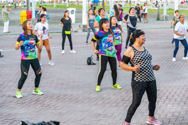 Dumaguete,Negros Island,Philippines-February 01 2023:Regular fun sessions are held outside,in the early evenings,attended mainly by women of a certain age,for phsical and mental well being.
