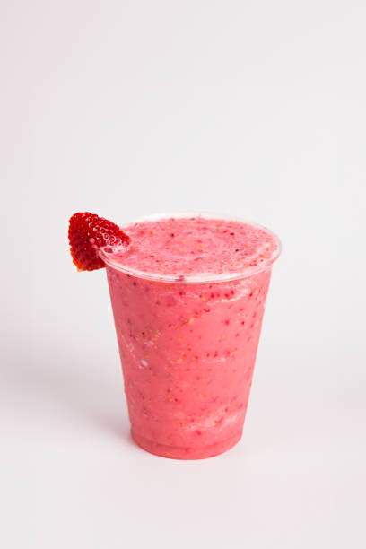 istock Strawberry fruit iced smoothie in a transparent glass 1615107589