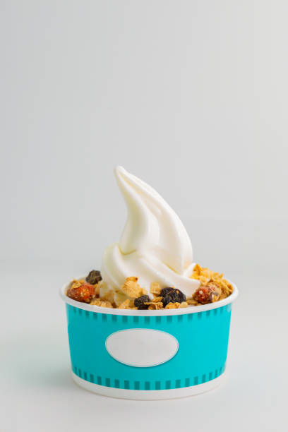 istock Vanilla soft ice cream with granola cereal 1615109744