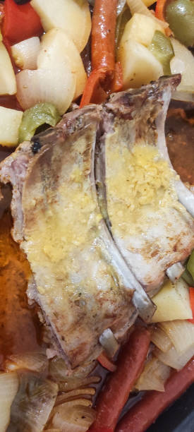 istock oven roasted ribs with sausage and potatoes 1615126613