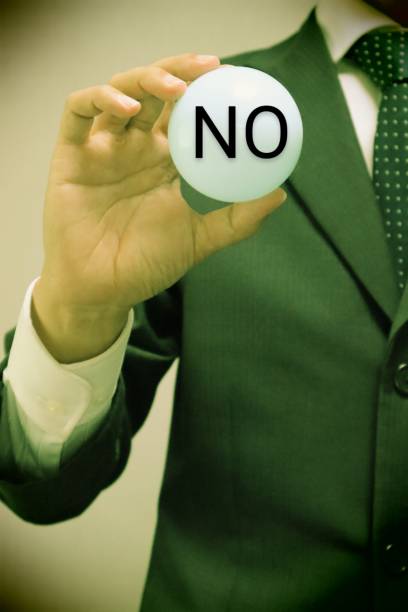 istock A person holding a ball that says NO 1615128672