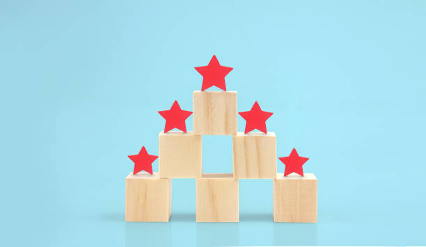istock Wooden blocks with the five star symbol Increase rating 1615183545