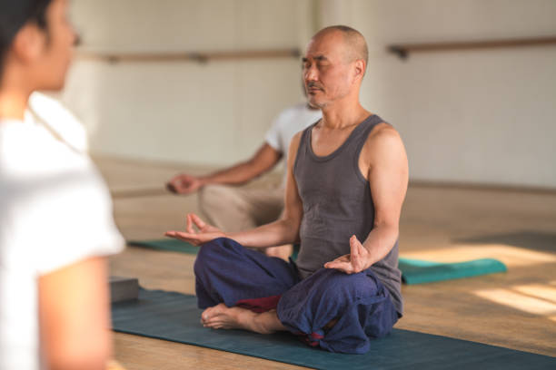 istock Ageless Zen: A Group of Active Seniors Finding Inner Peace Through Yoga and Meditation 1615288086