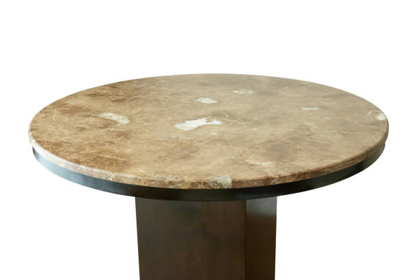 istock Marble stone table top isolated on white background for product display 1615296746