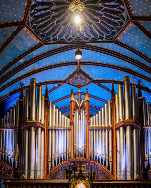 Notre Dame Basilica in Montreal Notre-Dame Basilica in historic Old Montreal. These are photos of the interior of the cathedral. historic pipe organ stock pictures, royalty-free photos & images