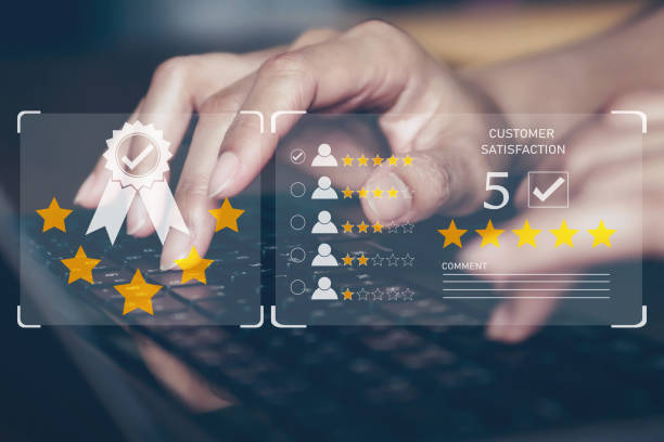 istock Customer review good rating concept, hand pressing keyboard and popup five star icon on visual screen for positive customer feedback, testimonial and testimony, user comment and feedback for review. 1615378569
