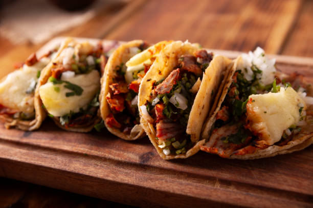 istock tacos al pastor closeup 1615398168