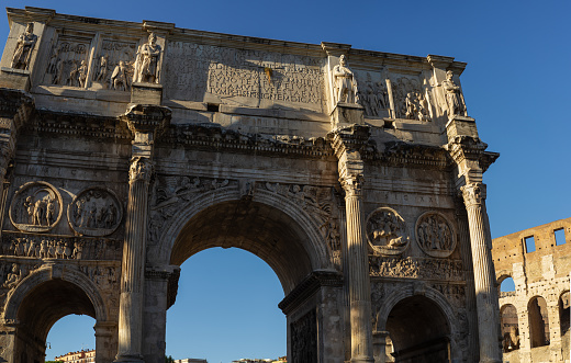 The Arch of Constantine, a triumphal arch with three arches, located in Rome, a short distance from the Colosseum in Rome, Italy